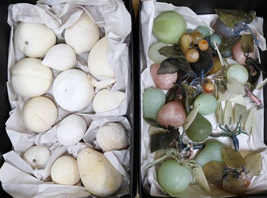 A quantity of marble and soapstone fruit and flowers